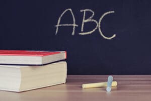 Chalk board and books