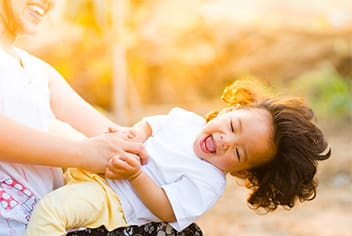 Child smiling in sun