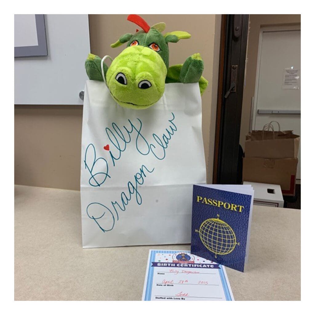 a stuffed toy in a paper bag for the reading buddies